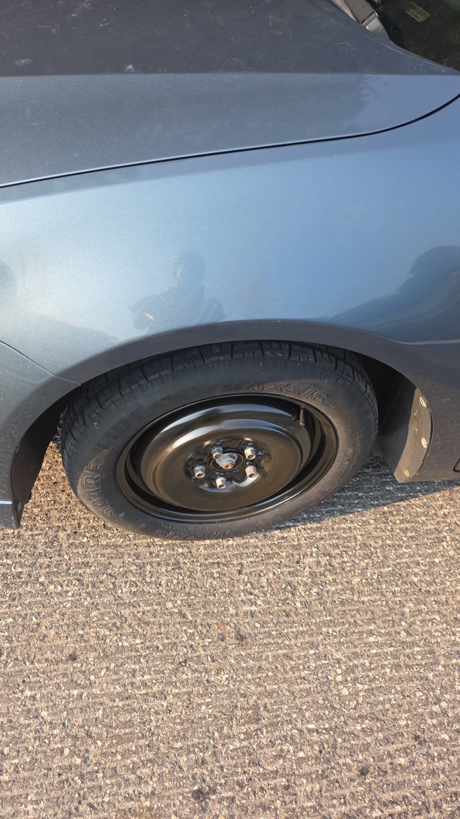 Spare tire fitted during a roadside call